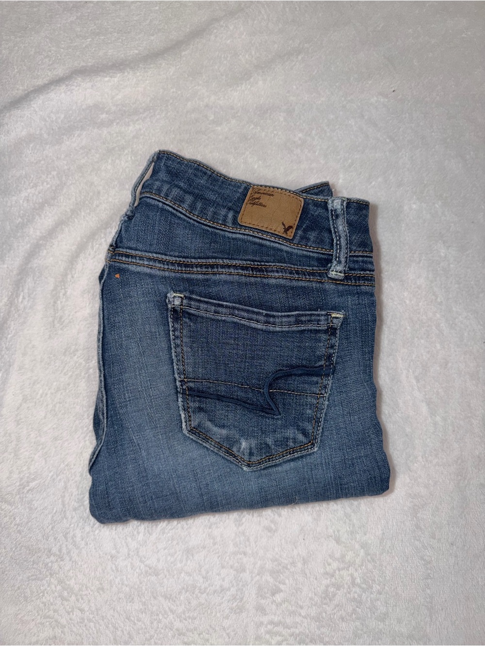 American Eagle Blue Jeans with Back Pocket Detail